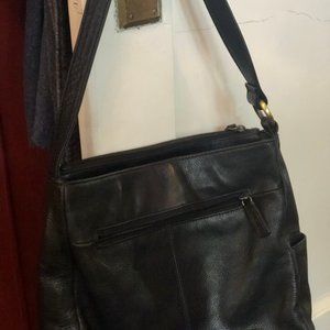 Rolf's black leather bag preowned